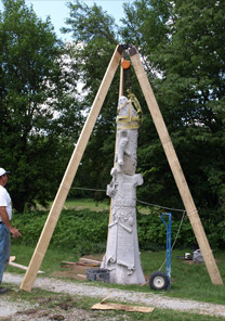 Fallen monument restored and reset